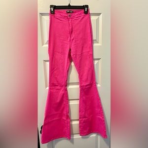 Neon pink flare pants